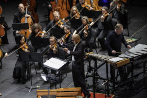 man directing an orchestra
