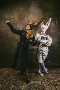 Ballet dancers in costume as March Hare and White Rabbit from Alice in Wonderland